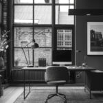 minimalistic office area, black and white --ar 2:3 --style raw --stylize 250 Job ID: 85bc09d6-3a26-4454-9fa1-b9adbf7ccd5d